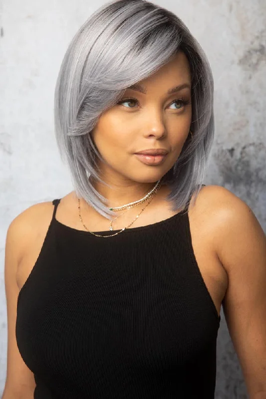 Colored wig with a wavy texture for a beachy and fun lookSilky Sleek <br>Synthetic Wig