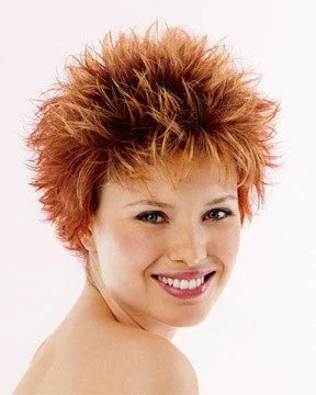 Short wig with auburn highlights for a warm and rich colorFoxy by Raquel Welch | Clearance