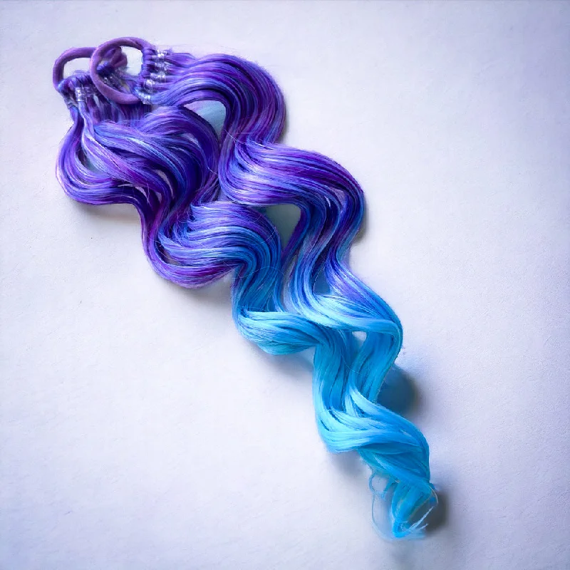 Braided ponytails with intricate patterns for an ethnic - inspired lookJellybean 20” Magic Ponies