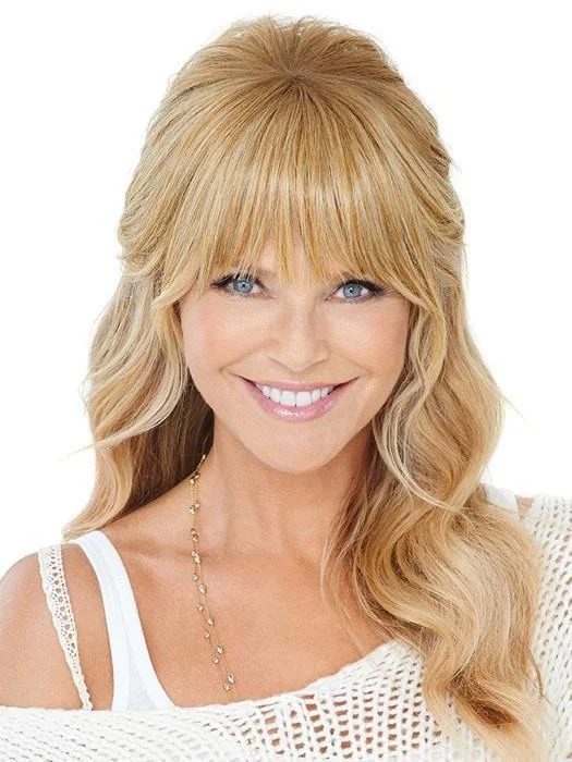 Short wig with a curly texture for a playful and youthful vibeNatural Fringe Clip-in Bang by Christie Brinkley | Heat-Friendly | CLOSEOUT