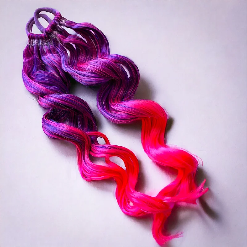 Black - colored ponytails for a classic and timeless appearanceTutti Fruity 20” Magic Ponies